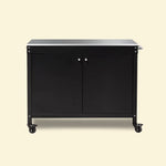 Desserte Bodega noire pour plancha Vivaplancha, plateau en inox, deux portes et roulettes, sur fond beige.